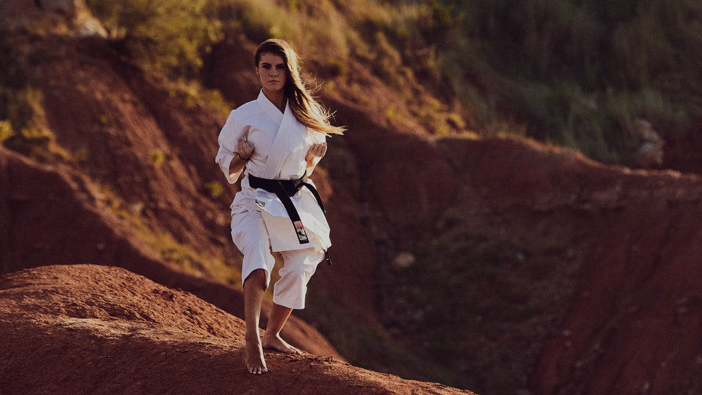 martial artist standing on red dirt